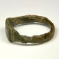 Late Roman engraved bronze ring with rectangular-to-trapezoidal face and decorated shoulders