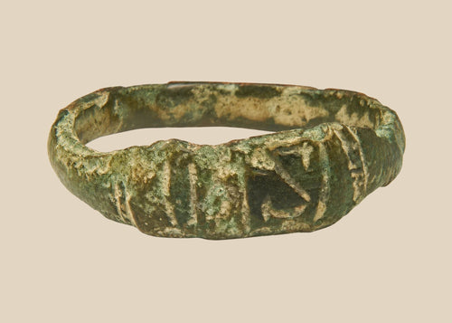 Late Roman bronze finger ring with engraved geometric bezel and aged archaeological patina, circa 3rd–5th century CE