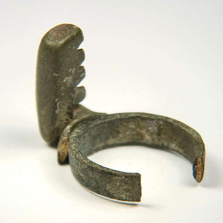 Late Roman bronze finger ring key with four-tooth key bit and dark green archaeological patina