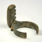 Late Roman bronze finger ring key with four-tooth key bit and dark green archaeological patina