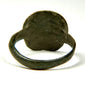 Rear view of Late Roman–Early Byzantine bronze finger ring showing solid bezel construction and circular band