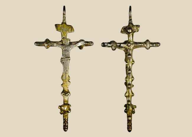 Antique silver crucifix pendant, circa 1780–1820, with sculpted Christ figure, INRI inscription, baroque-inspired detailing, and remnants of gilding. Southern European devotional piece used in Catholic ritual and personal devotion.