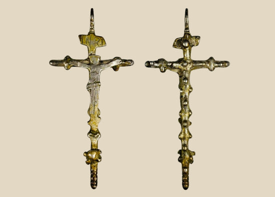 Antique silver crucifix pendant, circa 1780–1820, with sculpted Christ figure, INRI inscription, baroque-inspired detailing, and remnants of gilding. Southern European devotional piece used in Catholic ritual and personal devotion.