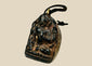 Antique Tibetan/Nepalese bronze Buddha amulet pendant, circa 1880–1920, with shrine-style niche, sealed brass back, original leather cord, and aged patina. Traditional devotional reliquary used for spiritual protection and meditation.