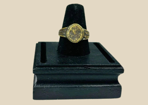 Late Roman to Early Byzantine gold-gilded bronze ring, circa 300–600 CE, with engraved floral bezel, worn gilding, and authentic patina.