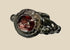 Ancient silver ring from the Eastern Mediterranean or Near East, Late Roman to Early Byzantine period (circa 300–600 CE), featuring a deep red garnet intaglio engraved with symbolic imagery, flanked by decorative silver nodes, preserving its historical elegance and craftsmanship.