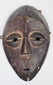 Authentic Lega passport mask featuring elongated facial form and stylized almond-shaped eyes.