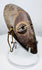 Compact Lega passport mask used as a personal insignia within the Bwami initiation system.