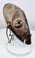 Compact Lega passport mask used as a personal insignia within the Bwami initiation system.