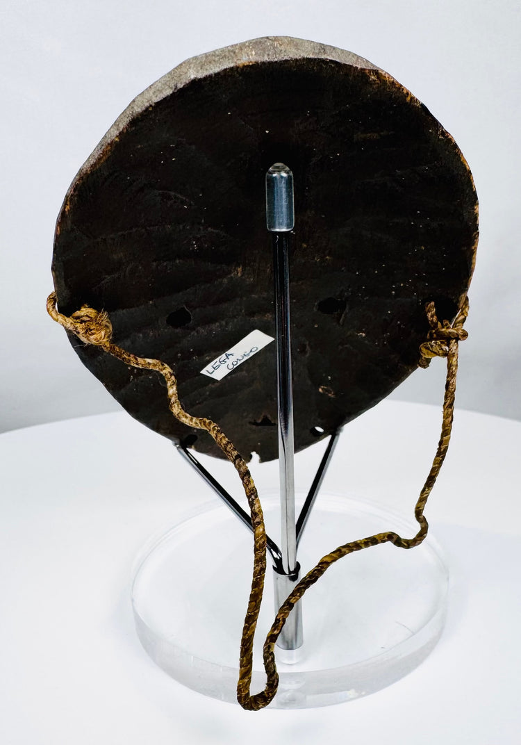 Rare Lega passport mask representing traditional moral and spiritual teachings of the Bwami society.