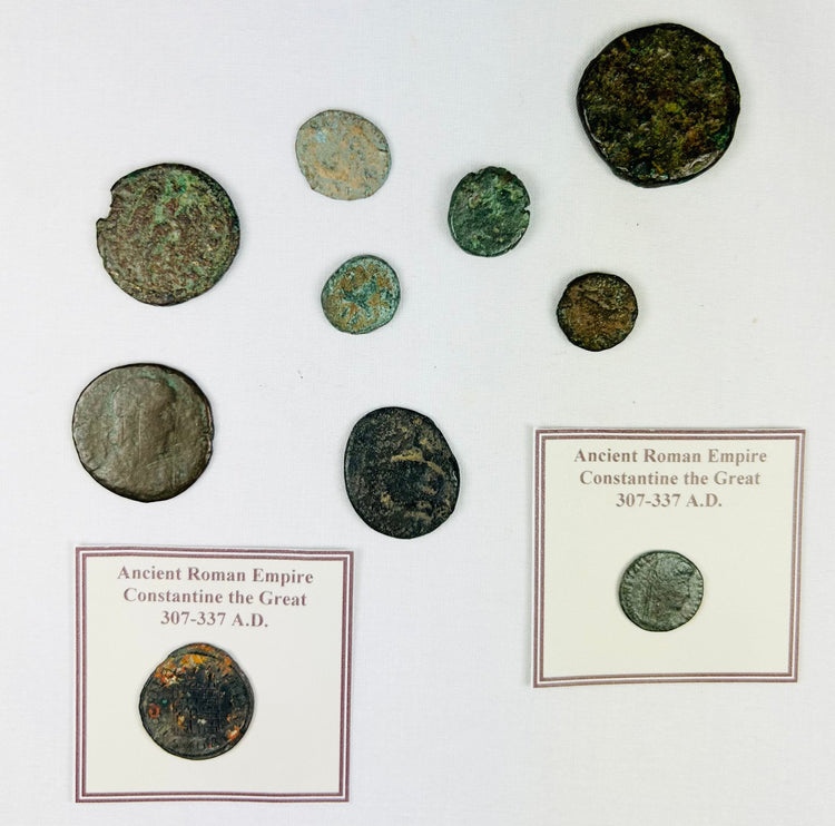 Ancient Roman coin reverse depicting symbolic imperial figure and archaeological surface texture