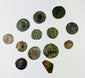 Ancient Roman coin reverse displaying deity and symbolic imagery