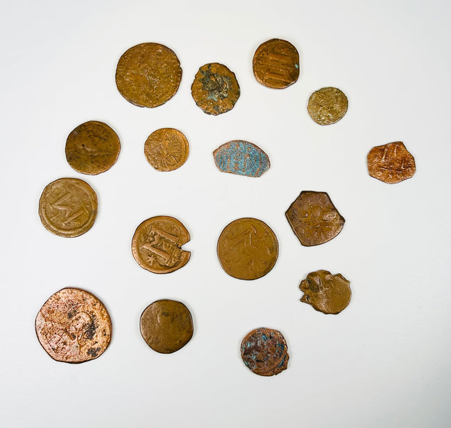 Roman and Byzantine bronze coin collection with visible denomination marks M and K