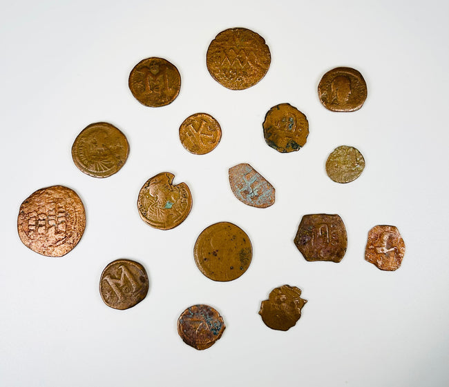 Group of excavated Roman Byzantine coins with green and brown burial patina