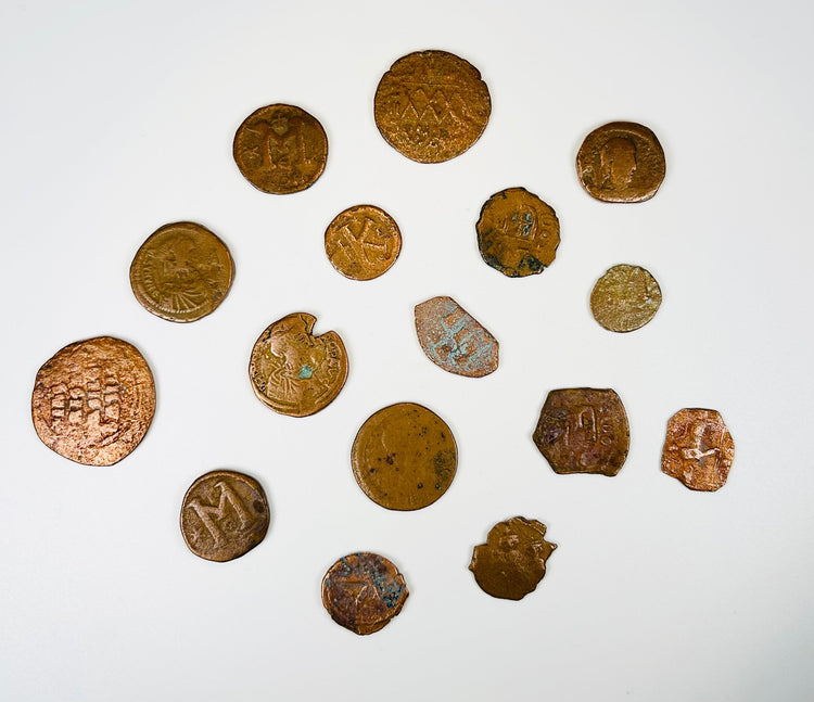 Group of excavated Roman Byzantine coins with green and brown burial patina