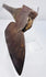 Reverse full-length view of an antique American broadhead axe showing the original wooden haft and aged steel blade.