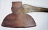 Full-length 19th-century M.H. Jones & Co. broad axe with long wooden handle and wide forged steel cutting head.