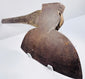 Opposite face of the antique forged steel axe head showing its broad blade profile, socket, and historic surface wear.