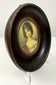 Side view of ebonized wooden frame holding Madame Récamier miniature portrait on acrylic stand