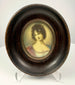 Frontal shot of oval ebonized frame containing rare 19th century Madame Récamier miniature