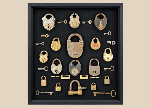 Vintage locks and keys display featuring 18 locks and 12 keys in frame