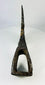 Antique medieval axe head with hollow socket and broad bearded blade