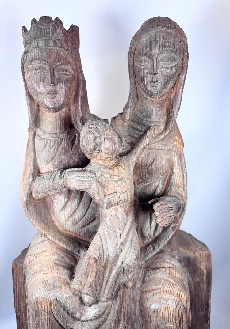 Antique Gothic Revival religious carving of Saint Anne seated beside the Virgin Mary with the Christ Child