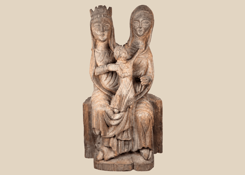 Hand-carved European wooden sculpture depicting the Virgin Mary, Saint Anne, and the Christ Child in Gothic Revival style