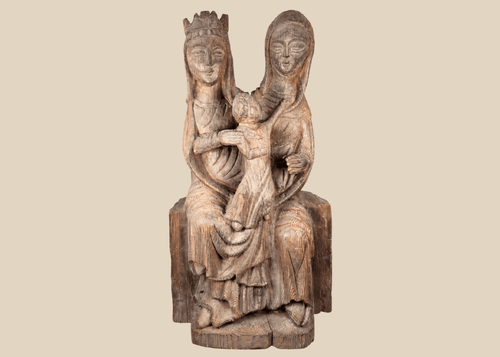Hand-carved European wooden sculpture depicting the Virgin Mary, Saint Anne, and the Christ Child in Gothic Revival style