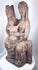 European religious wood carving with elongated Gothic facial features and flowing drapery