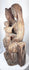 Antique devotional sculpture inspired by medieval Romanesque and Gothic church carvings