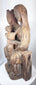 Antique devotional sculpture inspired by medieval Romanesque and Gothic church carvings