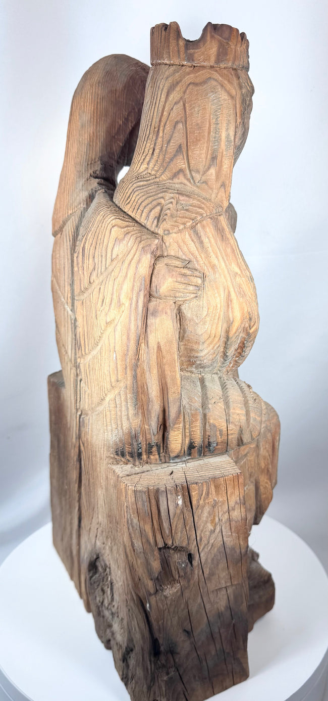 Antique European Gothic Revival devotional sculpture carved from a substantial single block of wood