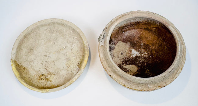 Open Sawankhalok ceramic box with the fitted lid placed beside the rounded body