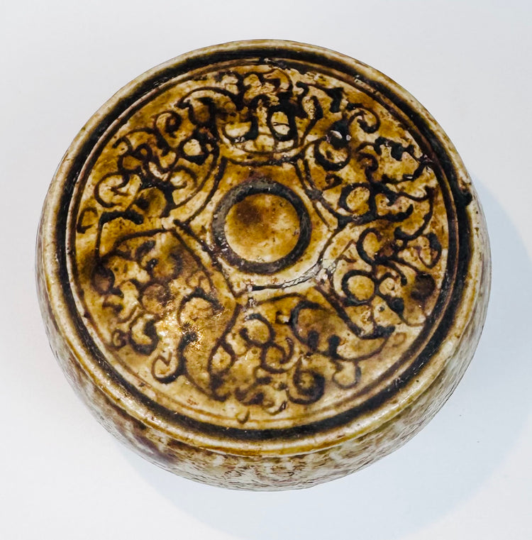 Side view of the medieval Thai box with cream slip and brown underglaze decoration