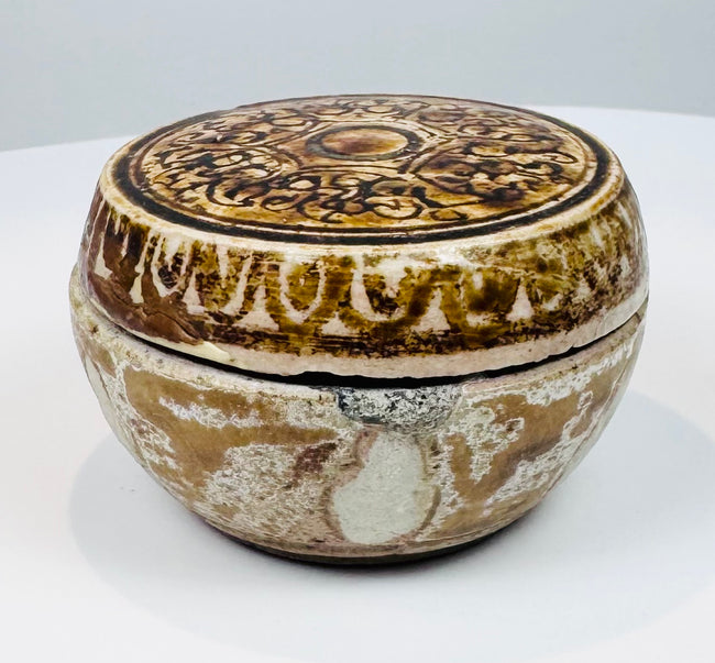 Elevated view of the Thai covered box showing the painted lid and circular knob