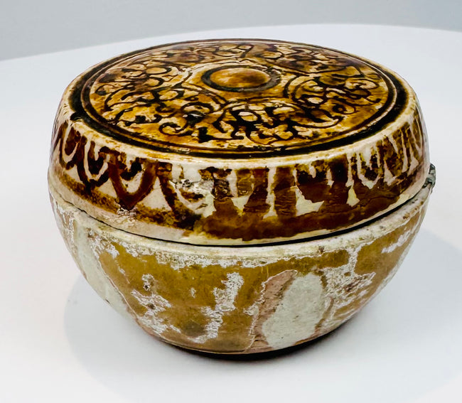 Three-quarter view of the iron-brown decorated Thai covered ceramic box