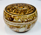 Small Sawankhalok lidded box showing its rounded body and domed cover