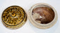 Interior view of the Thai covered box showing its brownish glaze and unglazed rim
