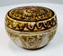 Angled view of the Thai ceramic box with cream glaze and painted meander border