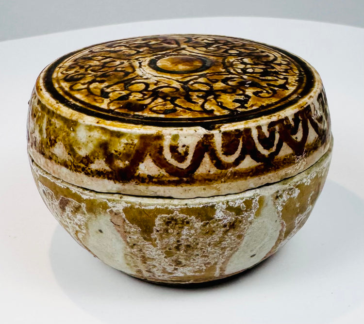 Angled view of the Thai ceramic box with cream glaze and painted meander border