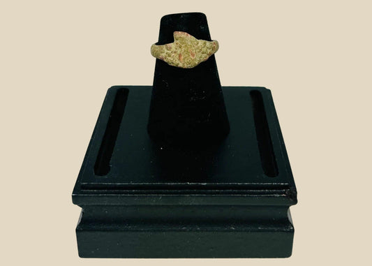 Ancient bronze ring from the Mediterranean or Middle East, 1st–5th century CE, with a bold bezel, natural patina, and simple, elegant design.