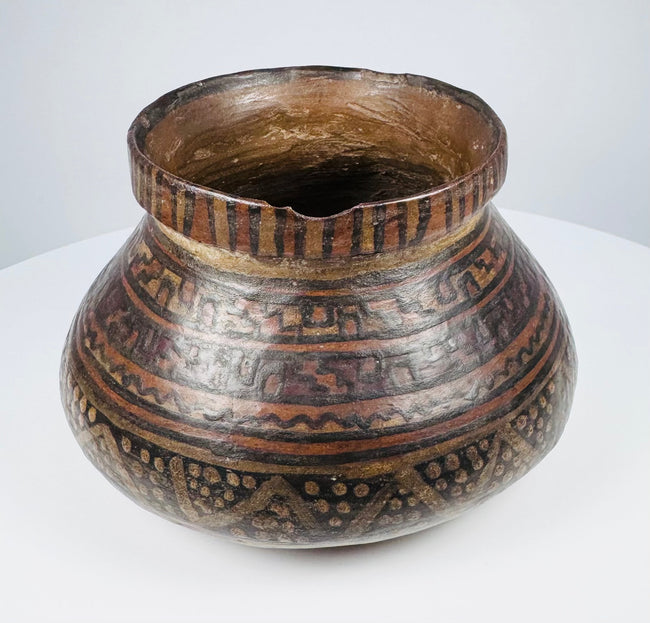 Mesoamerican polychrome redware pottery bowl with geometric painted decoration, circa 1st millennium CE