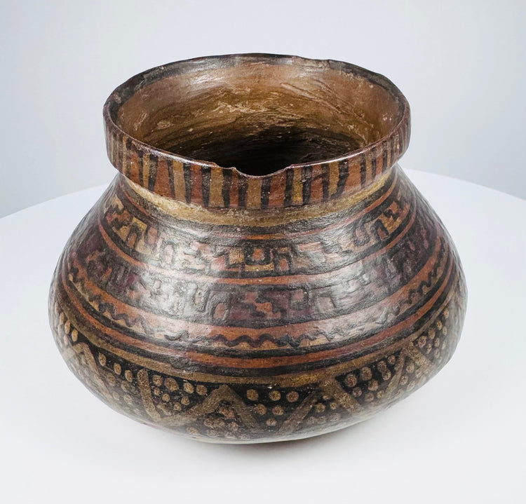 Mesoamerican polychrome redware pottery bowl with geometric painted decoration, circa 1st millennium CE