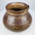 Ancient Mesoamerican pottery vessel showing short neck, broad rim and rounded decorated body