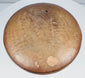Underside view of ancient Mesoamerican redware pottery bowl showing base, surface wear and documented condition