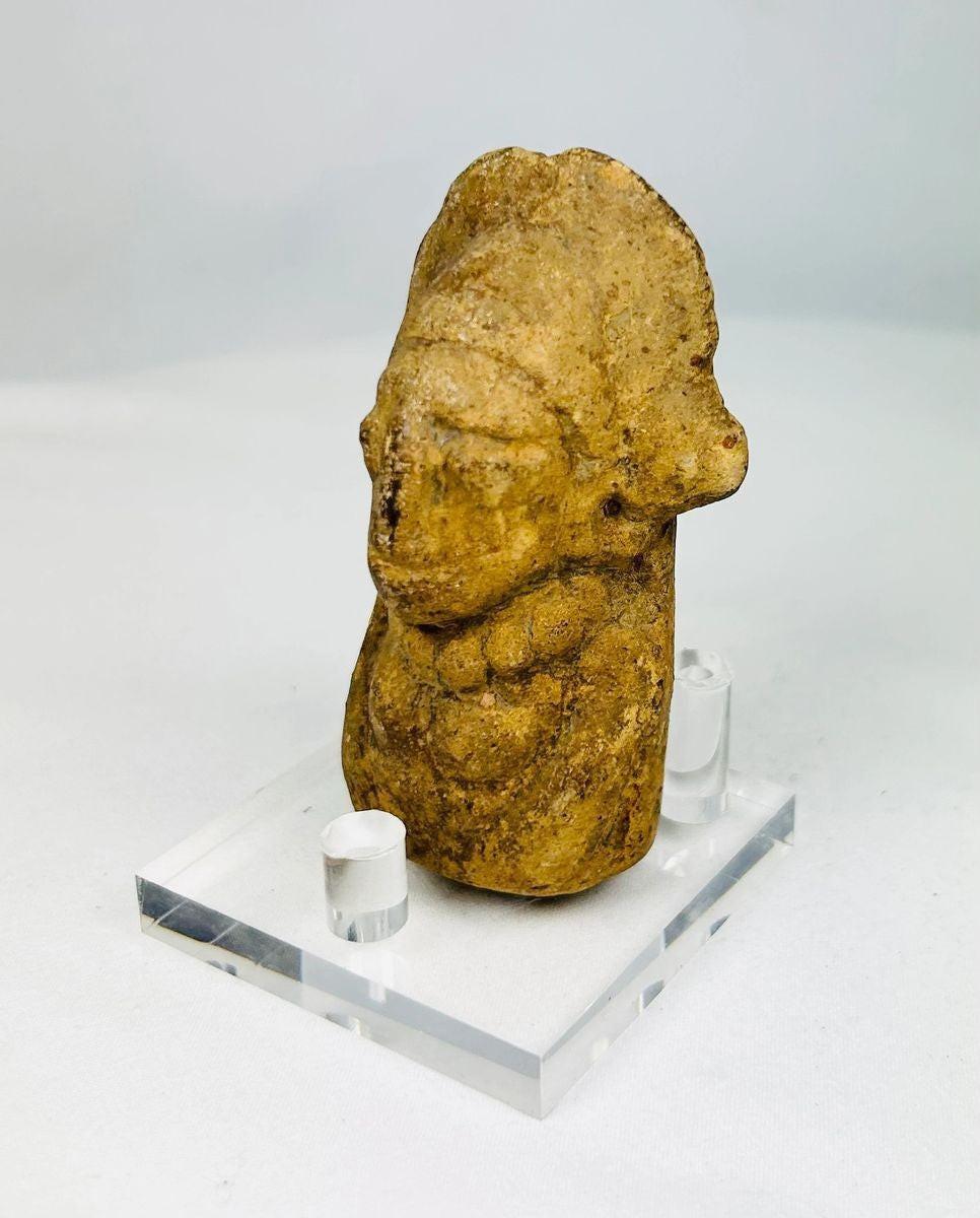 Pre-Columbian Mesoamerican terracotta bust with detailed headdress, circa 200 BCE–900 CE.