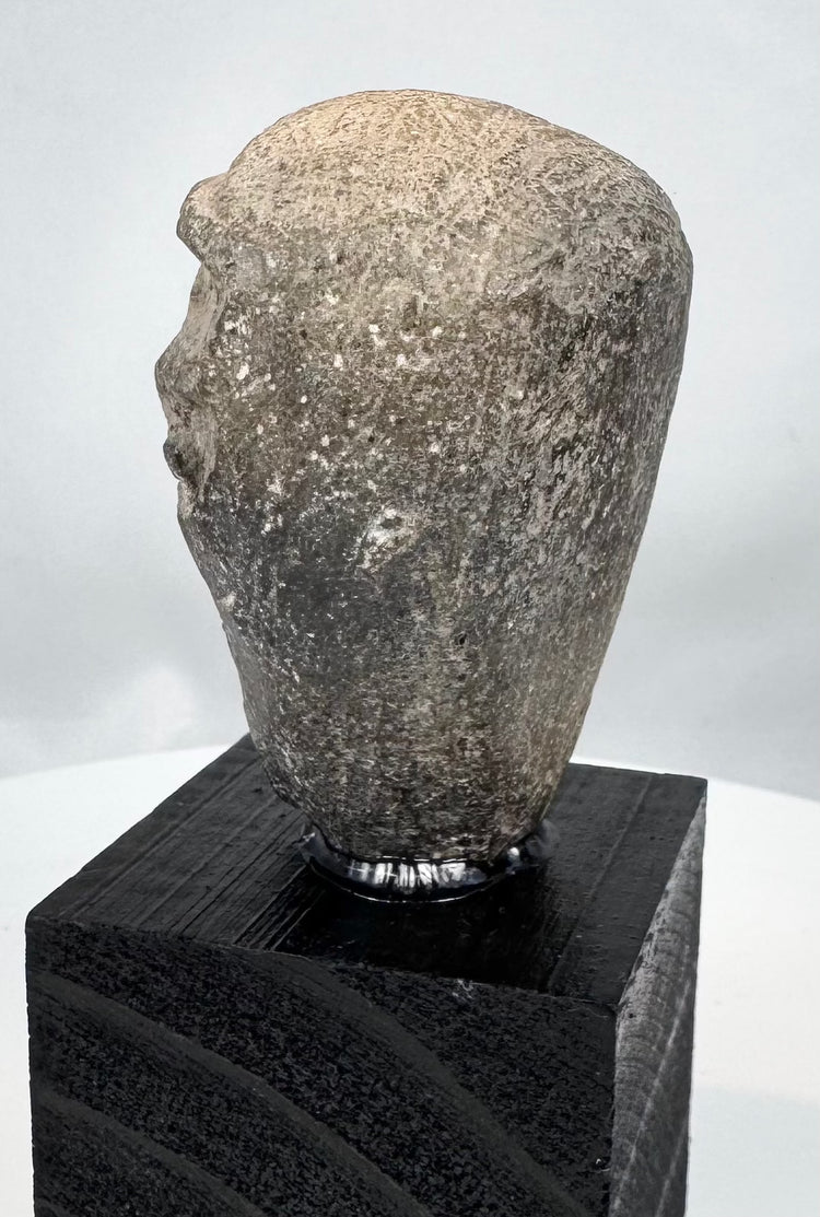 Near Eastern pottery head fragment with mask-like facial expression