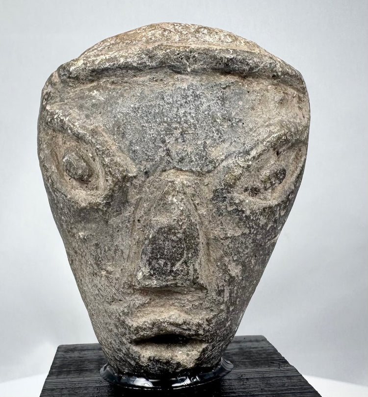 Old Babylonian period terracotta head mounted on a custom display stand