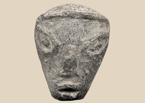 Ancient Mesopotamian pottery head of a stylized youthful figure, circa 2000–1500 BCE